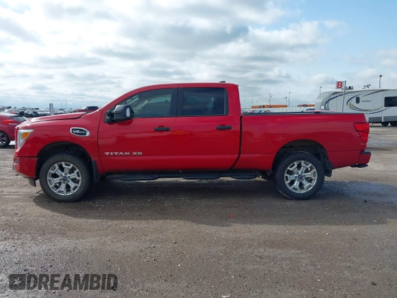 2023 Nissan Titan Pro-4X with VIN 1N6AA1FB9PN104089, listed as a IAAI auction lot 42202488 with 58,151 mi miles and . Bid and sale history available at DreamBid. Image 14.