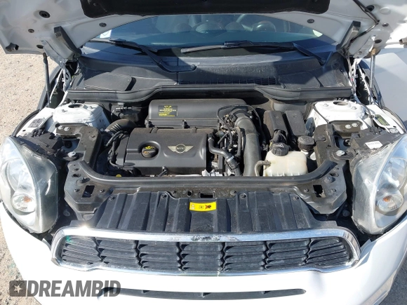 2014 MINI Countryman S z VIN WMWZC3C57EWP51864, wystawiony jako IAAI lot #42556774 z przebiegiem 73 912 mil mil oraz . Historia ofert i sprzedaży dostępna na DreamBid. Obrazek 10.