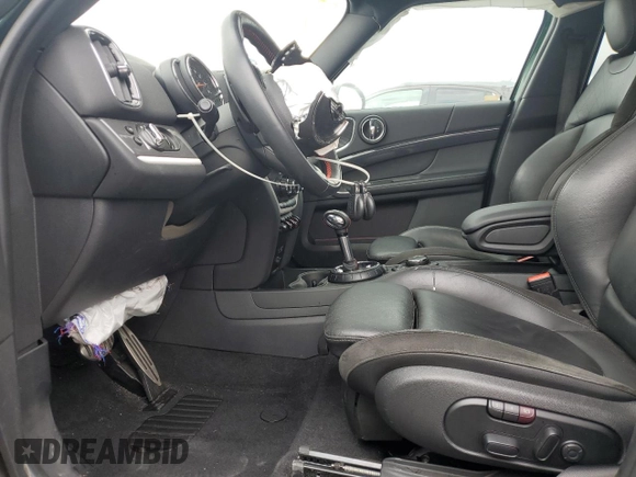 2017 MINI Countryman Cooper S z VIN WMZYT3C39H3D98632, wystawiony jako Copart lot #57314325 z przebiegiem 32 339 mil mil oraz Szkoda całkowita • Salvage title. Historia ofert i sprzedaży dostępna na DreamBid. Obrazek 7.