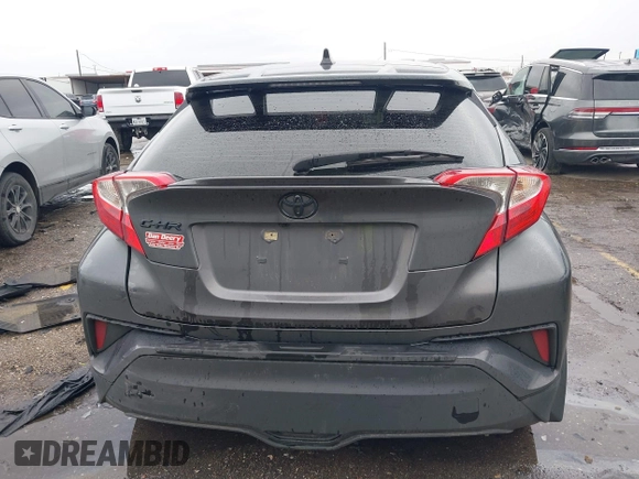 2021 Toyota C-HR LE with VIN JTNKHMBX0M1129080, listed as a IAAI auction lot 41321604 with 52,916 mi miles. Bid and sale history available at carsss.com. Image 16.