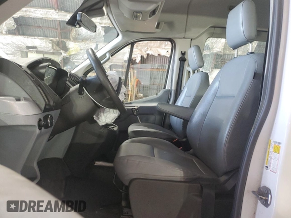 2017 Ford Transit XL with VIN 1FMZK1CM5HKB17834, listed as a Copart auction lot 63001115 with 69,665 mi miles and Salvage title. Bid and sale history available at DreamBid. Image 7.
