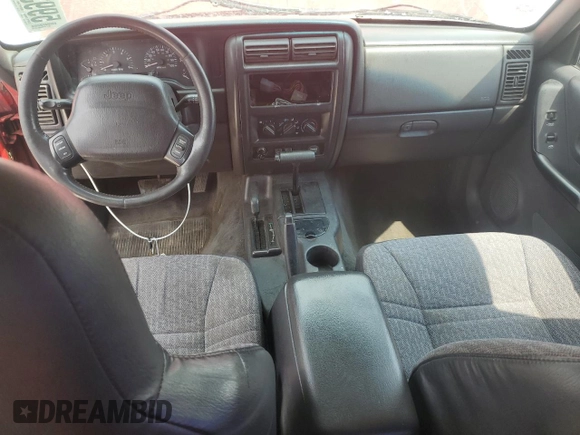 2000 Jeep Cherokee with VIN 1J4FF48S3YL257793, listed as a Copart auction lot 59932535 with 280,237 mi miles and Clean title. Bid and sale history available at DreamBid. Image 8.