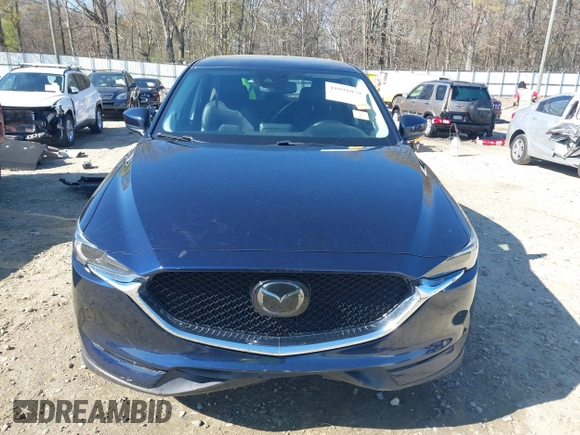2018 Mazda CX-5 Grand Touring with VIN JM3KFADM1J0322049, listed as a IAAI auction lot 41891079 with 174,939 mi miles and . Bid and sale history available at DreamBid. Image 12.