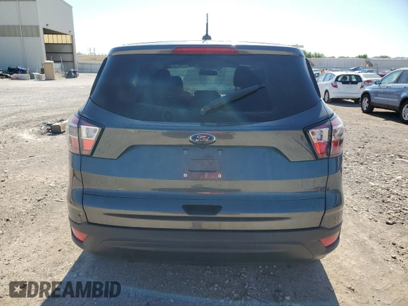 2018 Ford Escape S with VIN 1FMCU0F7XJUA28402, listed as a Copart auction lot 57955745 with 104,625 mi miles and Salvage title. Bid and sale history available at DreamBid. Image 6.