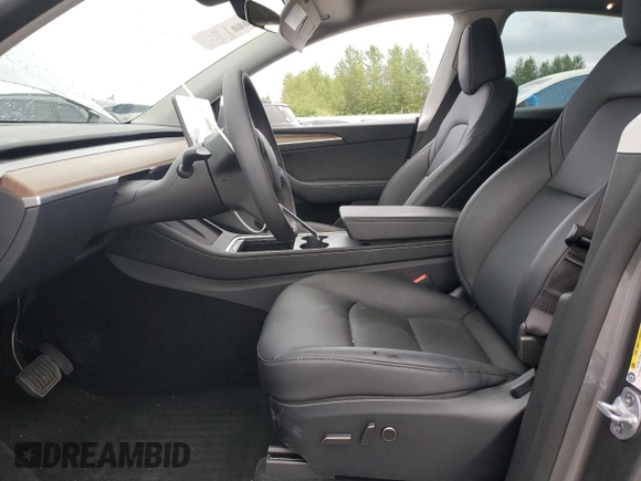 2024 Tesla Model Y Long Range with VIN 7SAYGDEE1RF159332, listed as a Copart auction lot 61179495 with 9,259 mi miles and Salvage title. Bid and sale history available at DreamBid. Image 7.