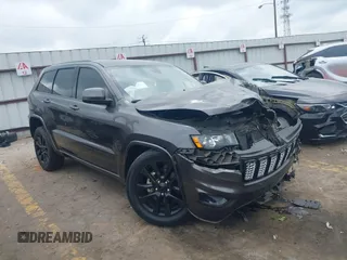 2019 Jeep Grand Cherokee Altitude with VIN 1C4RJEAG6KC580143, listed as a IAAI auction lot 42103226 with 156,144 mi miles and . Bid and sale history available at DreamBid. Image 1.