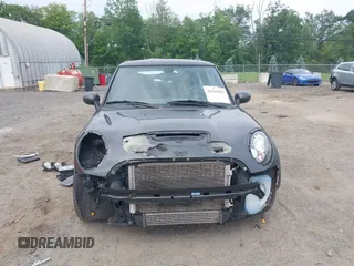 2011 MINI Hardtop S with VIN WMWSV3C58BTY13412, listed as a IAAI auction lot 42516587 with 124,831 mi miles and . Bid and sale history available at DreamBid. Image 6.