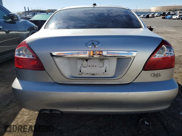 2003 Infiniti Q45 z VIN JNKBF01AX3M103002, wystawiony jako Copart lot #47860175 z przebiegiem 317 912 mil mil oraz Tytuł czysty. Historia ofert i sprzedaży dostępna na DreamBid. Obrazek 6.