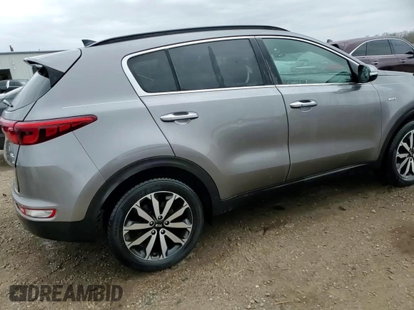 2018 Kia Sportage EX z VIN KNDPNCAC6J7384899, wystawiony jako Copart lot #53459515 z przebiegiem 49 229 mil mil oraz Szkoda całkowita • Salvage title. Historia ofert i sprzedaży dostępna na DreamBid. Obrazek 15.