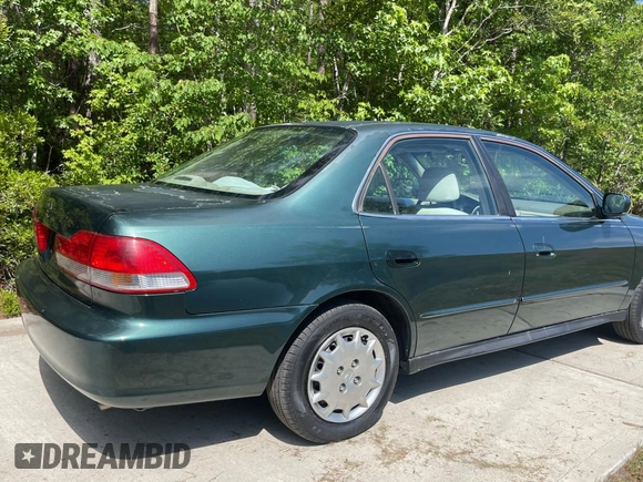 2002 Honda Accord LX z VIN 1HGCG56442A044999, wystawiony jako Copart lot #56222325 z przebiegiem Nie podano mil oraz Czysty tytuł • Clean title. Historia ofert i sprzedaży dostępna na DreamBid. Obrazek 4.