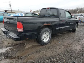 2001 Dodge Dakota Sport z VIN 1B7GL22N31S137577, wystawiony jako Copart lot #50119405 z przebiegiem Nie podano mil oraz Czysty tytuł • Clean title. Historia ofert i sprzedaży dostępna na DreamBid. Obrazek 3.