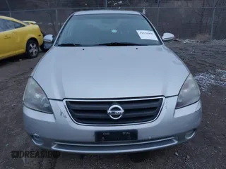 2003 Nissan Altima SE z VIN 1N4BL11E33C302441, wystawiony jako IAAI lot #41156458 z przebiegiem 123 796 mil mil oraz . Historia ofert i sprzedaży dostępna na DreamBid. Obrazek 6.