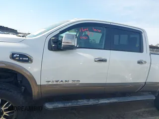 2016 Nissan Titan Platinum Reserve z VIN 1N6BA1F22GN509568, wystawiony jako IAAI lot #41766629 z przebiegiem 94 991 mil mil oraz . Historia ofert i sprzedaży dostępna na DreamBid. Obrazek 14.