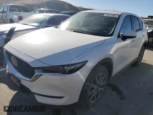 2018 Mazda CX-5 Grand Touring with VIN JM3KFADM3J1410210, listed as a Copart auction lot 44031365 with 69,016 mi miles and Clean Title. Bid and sale history available at DreamBid. Image 1.