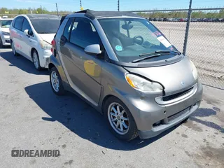 2009 Smart fortwo Passion with VIN WMEEK31XX9K292529, listed as a IAAI auction lot 41836326 with 75,750 mi miles. Bid and sale history available at carsss.com. Image 1.