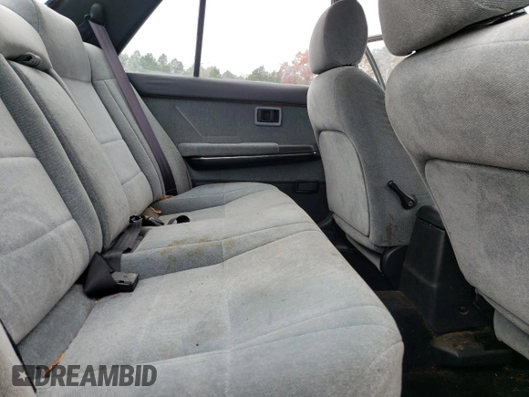 1992 Nissan Stanza GXE с VIN JN1FU21P3NX909177, выставлен на аукционе Copart как лот 83811334 с пробегом 67 101 миль миль и Списание • Salvage title. История ставок и продаж доступна на DreamBid. Изображение 11.