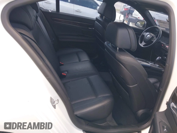 2014 BMW 7 Series 740i with VIN WBAYA6C53ED144195, listed as a IAAI auction lot 41720500 with 123,776 mi miles and . Bid and sale history available at DreamBid. Image 8.