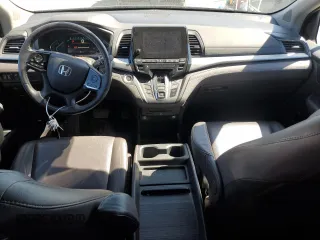 2018 Honda Odyssey EX-L with VIN 5FNRL6H78JB069850, listed as a Copart auction lot 49771875 with 103,914 mi miles and Salvage Title. Bid and sale history available at DreamBid. Image 8.
