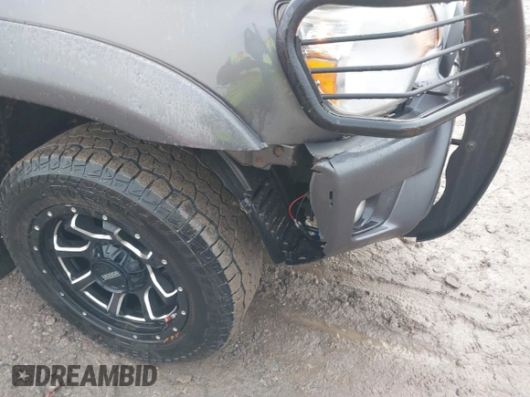 2015 Toyota Tacoma with VIN 3TMLU4EN7FM201302, listed as a IAAI auction lot 41666606 with 200,504 mi miles and . Bid and sale history available at DreamBid. Image 6.