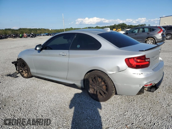 2015 BMW 2 Series M235i with VIN WBA1J7C57FV254038, listed as a Copart auction lot 73657294 with 117,883 mi miles and Salvage Title. Bid and sale history available at carsss.com. Image 2.