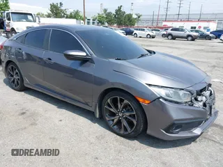 2019 Honda Civic Sport with VIN 2HGFC2F80KH502792, listed as a IAAI auction lot 42385641 with 69,913 mi miles and . Bid and sale history available at DreamBid. Image 1.