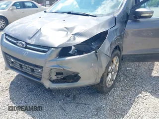 2013 Ford Escape SEL with VIN 1FMCU0HXXDUD51754, listed as a IAAI auction lot 42696434 with 145,705 mi miles and . Bid and sale history available at DreamBid. Image 6.