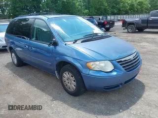 2007 Chrysler Town & Country LX with VIN 2A4GP44R47R146955, listed as a IAAI auction lot 42258849 with 161,258 mi miles and . Bid and sale history available at DreamBid. Image 1.