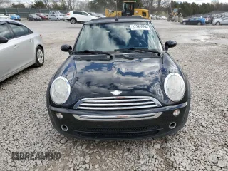 2005 MINI Convertible with VIN WMWRF33485TG11549, listed as a Copart auction lot 87285984 with 58,934 mi miles and Salvage title. Bid and sale history available at DreamBid. Image 5.