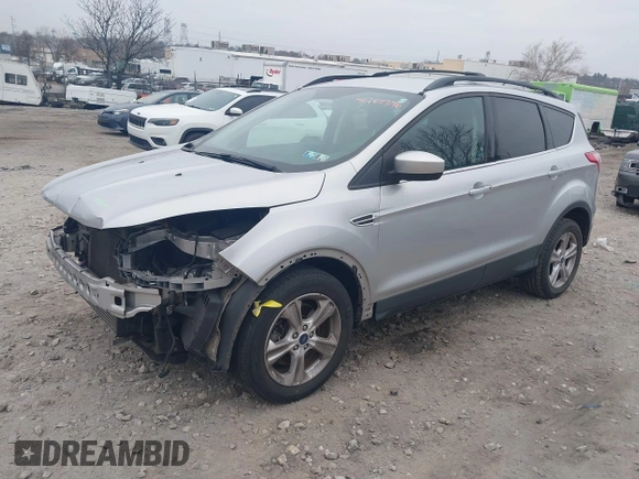2016 Ford Escape SE with VIN 1FMCU9GX3GUB65337, listed as a IAAI auction lot 41767376 with 99,092 mi miles. Bid and sale history available at carsss.com. Image 2.