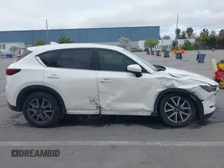 2018 Mazda CX-5 Grand Touring with VIN JM3KFADM1J0309995, listed as a IAAI auction lot 41977003 with 75,303 mi miles. Bid and sale history available at carsss.com. Image 14.