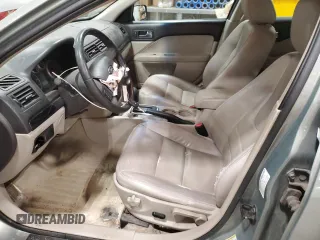 2009 Ford Fusion SEL with VIN 3FAHP08199R214306, listed as a Copart auction lot 52972715 with 230,255 mi miles and Non Repairable. Bid and sale history available at DreamBid. Image 7.