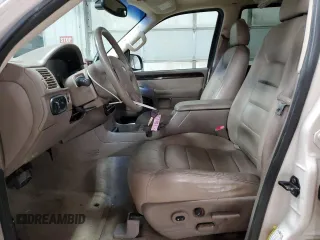 2005 Ford Explorer with VIN 1FMDU75K05ZA54907, listed as a Copart auction lot 80825574 with 154,681 mi miles and Salvage title. Bid and sale history available at DreamBid. Image 7.