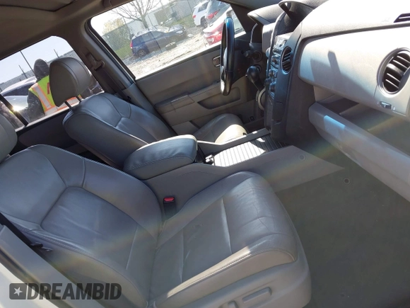 2012 Honda Pilot EX-L with VIN 5FNYF4H5XCB057255, listed as a IAAI auction lot 42001389 with 187,200 mi miles and . Bid and sale history available at DreamBid. Image 5.