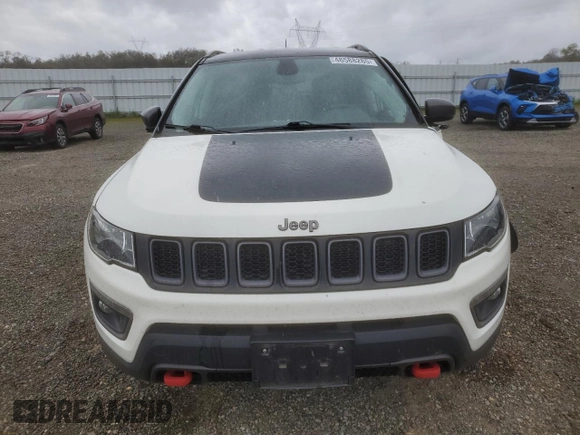 2019 Jeep Compass Trailhawk with VIN 3C4NJDDB4KT790351, listed as a Copart auction lot 48588285 with 67,417 mi miles and Salvage Title. Bid and sale history available at DreamBid. Image 5.