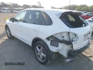 2014 Porsche Cayenne with VIN WP1AA2A23ELA97180, listed as a IAAI auction lot 42072423 with 143,374 mi miles and . Bid and sale history available at DreamBid. Image 3.