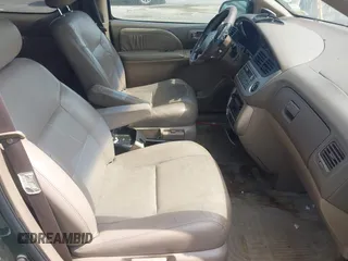 2002 Toyota Sienna LE z VIN 4T3ZF13C22U422237, wystawiony jako IAAI lot #42495778 z przebiegiem 114 178 mil mil oraz . Historia ofert i sprzedaży dostępna na DreamBid. Obrazek 5.