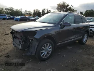 2017 Volkswagen Touareg Sport with VIN WVGEF7BP0HD005996, listed as a Copart auction lot 72883304 with 66,167 mi miles and Salvage Title. Bid and sale history available at DreamBid. Image 1.
