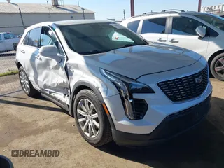 2020 Cadillac XT4 FWD Luxury with VIN 1GYAZAR45LF039362, listed as a IAAI auction lot 41445409 with 76,869 mi miles. Bid and sale history available at carsss.com. Image 1.