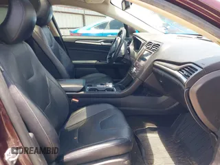 2018 Ford Fusion Titanium with VIN 3FA6P0K92JR114283, listed as a IAAI auction lot 42704476 with 92,502 mi miles and . Bid and sale history available at DreamBid. Image 5.