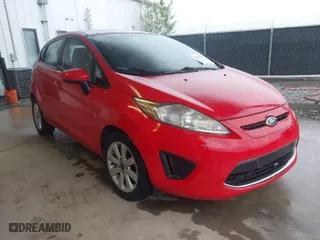 2012 Ford Fiesta SE with VIN 3FADP4EJ4CM215670, listed as a IAAI auction lot 41980900 with 87,874 mi miles. Bid and sale history available at carsss.com. Image 1.