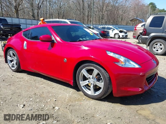 2009 Nissan 370Z Touring with VIN JN1AZ44E69M405179, listed as a IAAI auction lot 41762303 with 132,853 mi miles and . Bid and sale history available at DreamBid. Image 1.