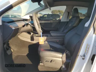 2023 Tesla Model Y Long Range with VIN 7SAYGDEE9PA129876, listed as a Copart auction lot 41819605 with 36,110 mi miles and Salvage Title. Bid and sale history available at DreamBid. Image 7.