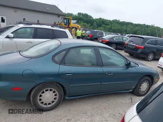1996 Ford Taurus LX with VIN 1FALP53S3TG177324, listed as a IAAI auction lot 42622520 with 126,979 mi miles and . Bid and sale history available at DreamBid. Image 13.