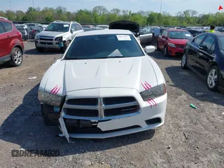 2014 Dodge Charger SE with VIN 2C3CDXBG5EH197260, listed as a IAAI auction lot 42072916 with 183,206 mi miles and . Bid and sale history available at DreamBid. Image 12.