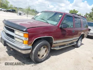1999 Chevrolet Tahoe Z71 z VIN 1GNEK13R7XJ444925, wystawiony jako IAAI lot #42261246 z przebiegiem 183 530 mil mil oraz . Historia ofert i sprzedaży dostępna na DreamBid. Obrazek 2.