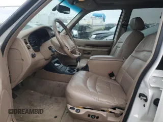 1999 Ford Explorer XLT z VIN 1FMDU35P0XZB93331, wystawiony jako Copart lot #89057375 z przebiegiem 94 699 mil mil oraz Szkoda całkowita • Salvage title. Historia ofert i sprzedaży dostępna na DreamBid. Obrazek 7.