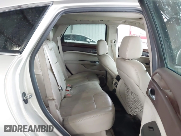 2013 Cadillac SRX Performance Collection z VIN 3GYFNCE31D5611616, wystawiony jako IAAI lot #42119169 z przebiegiem 159 019 mil mil oraz . Historia ofert i sprzedaży dostępna na DreamBid. Obrazek 8.
