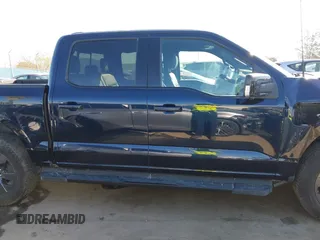 2022 Ford F-150 Lightning Pro z VIN 1FT6W1EV8NWG04113, wystawiony jako IAAI lot #41765532 z przebiegiem 48 990 mil mil oraz . Historia ofert i sprzedaży dostępna na DreamBid. Obrazek 13.