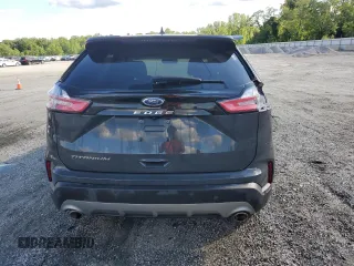 2021 Ford Edge Titanium z VIN 2FMPK3K96MBA54764, wystawiony jako Copart lot #55593715 z przebiegiem 49 729 mil mil oraz Szkoda całkowita • Salvage title. Historia ofert i sprzedaży dostępna na DreamBid. Obrazek 6.