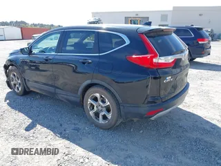 2018 Honda CR-V EX with VIN 7FARW1H57JE042281, listed as a IAAI auction lot 41897670 with 87,319 mi miles. Bid and sale history available at carsss.com. Image 3.
